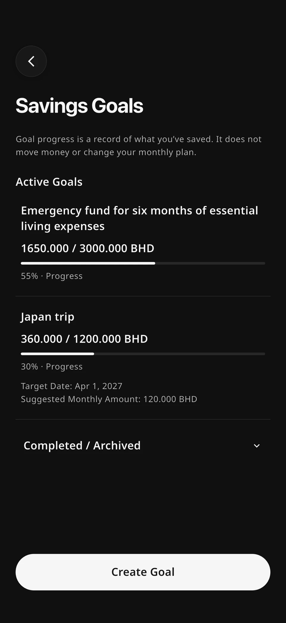 Savings Goals in Dark appearance showing synthetic Japan trip and emergency fund progress